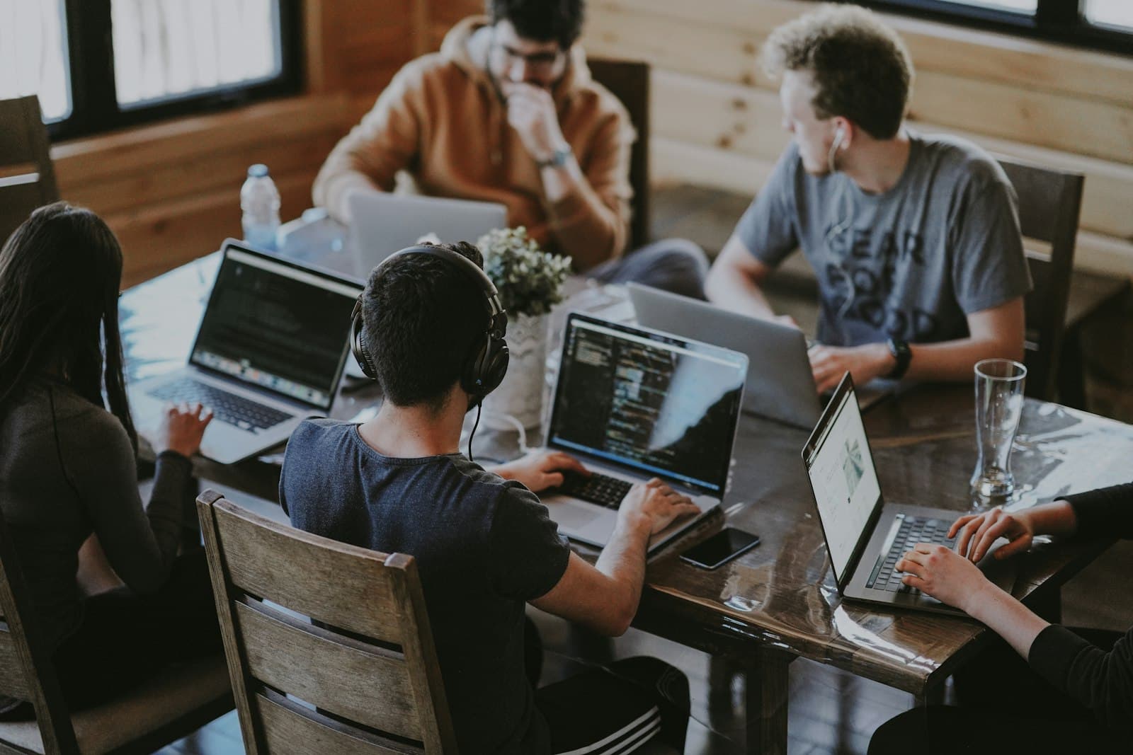 Founders working together around a table